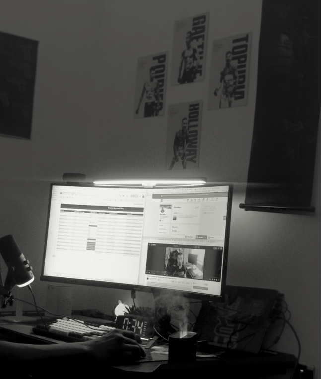 Dan Akeju working at his desk